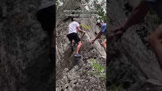 At least he’s never bored😂🏄‍♂️🧗‍♂️#shorts #couple #action #surf #climbing #shortsfeed #beach