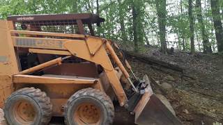 Moving gravel with the Case 1845c skid steer