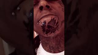 TBT: Lil Wayne when he first got the Eye of Providence and "Mom's boy" in Arabic face tattoos