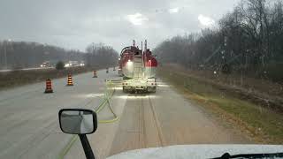 In the tanker following the PC5000 road grinder