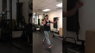 Dumbbell Front Rack Single Arm Walking Lunges