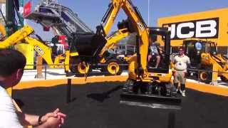 Young boy operate an excavator JCB