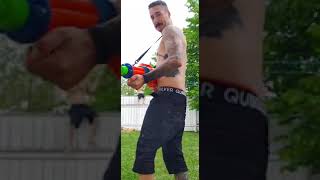 having a water fight with my son