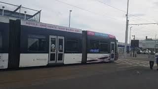 Blackpool tram passing the sandcastle centre near the pleasure beach