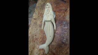 Mermaid Woodcarving and Rasputin Wood carving