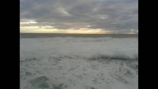 Sea Point Promenade: Foamy Waves are spilling onto the pavement