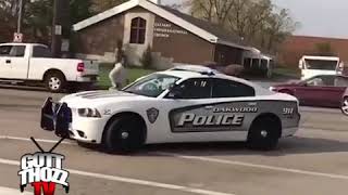 GUN man Hijacks POLICE CAR on camera