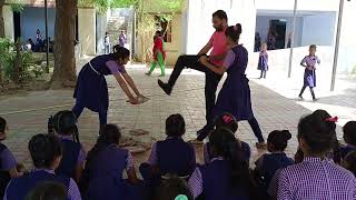 school girl breaking tile.