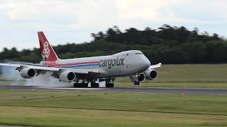 Landing of a Cargolux B747-8F in Luxembourg leaving behind a huge smoke cloud