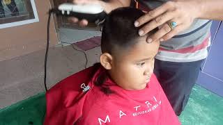 Cara cepat dan mudah Memotong rambut anak.