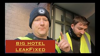 fixing a leak in an hotel, we nearly broke the glass balcony!