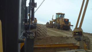 earth shoulder construction with Deere graders