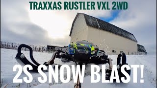 Traxxas Rustler vxl 2wd in the snow with ski’s & paddle tires!