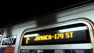 R160 F train entering and departing Roosevelt Avenue