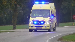 ambulance 21-132 met spoed naar een melding in Herpen