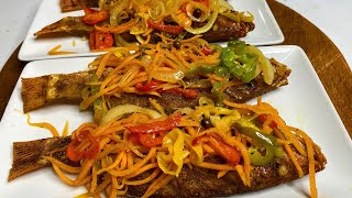 Escovitch Fish, Jamaican Style, Fried Snapper topped with pickled vegetables sauce.