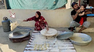 "Love in the oven fire: pure moments of a nomadic couple in baking local bread"💞👨‍👩‍👧🫓