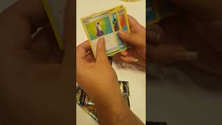 Opening a pack of Pokemon TCG in the Nintendo Store!