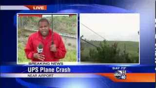 Larry Miller reporting live from the scene of the UPS plane crash in Birmingham, Alabama