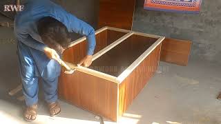 A Carpenter Making A Wooden Wardrobe for Wall