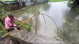 Village Old man fishing after raining।।বৃস্টির পরে নতুন পানিতে মাছ ধরছে গ্রামের বৃদ্ধ লোক।