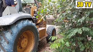 BACKHOE IN ACTION AT MALAYSIA