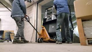 Cooler falls off loading dock