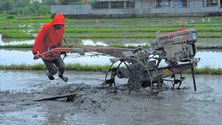 Farmer Operating Hand Tractor Like A Boss