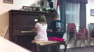 Kids playing piano