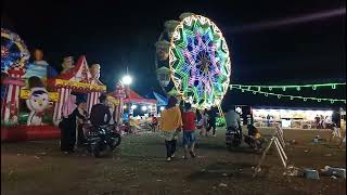 Suasana malam hari di lapangan kecamatan Pakel hiburan rakyat pasar malam, 2024