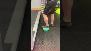 Leg press into ball on the ground