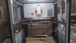 Kraft Paper Box Roll Die Cutting Creasing Machine inline Flexo Machine working in Indonesia