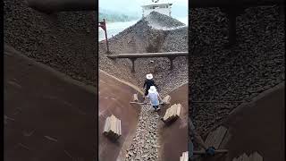 (33) Decompression healing video - Process of unloading tons of crushed rocks on barge