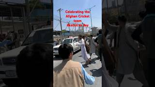 Celebrating the victory of the Afghanistan cricket team against Bangladesh.