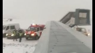 Watch SNOW emergency plane danger as the aircraft loses control and skids off runway