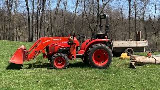 Kubota L2501 Cleaning Up Trees From Off Of The Fences. Cutting,splitting, stacking ,and hauling.