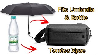 Can Tomtoc T21 Xpac Sling Bag fits both Bottle and Umbrella ?