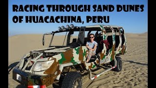 Racing through sand dunes of Huacachina, Peru