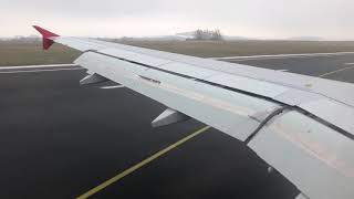 Austrian A320 OS568 - OE-LBM Landing Vienna Runway16 - wingview Seat 22A