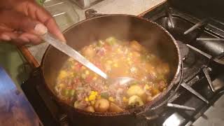 Cooking a home made pot of garden stew.