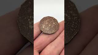 Metal detecting two coins on the beach