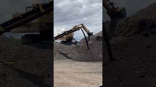 Excavator and Asphalt Millings #constructionequipment #excavator #crusher #construction #caterpillar