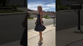 Christina prancing around my neighborhood in a lovely little girly dress and super high heels! 💋👩