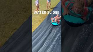 HOMEMADE WATER SLIDE!! #shorts #slide #viral