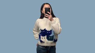 Crocheting a sweater full of cats