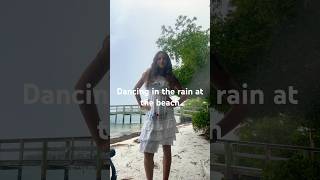 Dancing in the rain at the beach