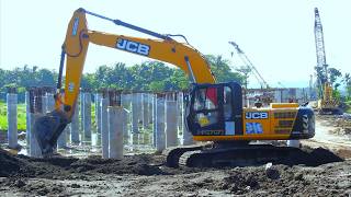 Komatsu Excavator Crawler Crane Drilling Rig Working On The Bridge Foundation Construction