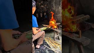 Craftsmen use traditional techniques to make bamboo chairs