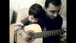 4 years old Edgar Atajanyan play on guitar