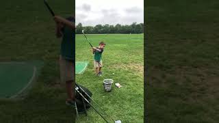 Rocco at 3 years old at driving range.